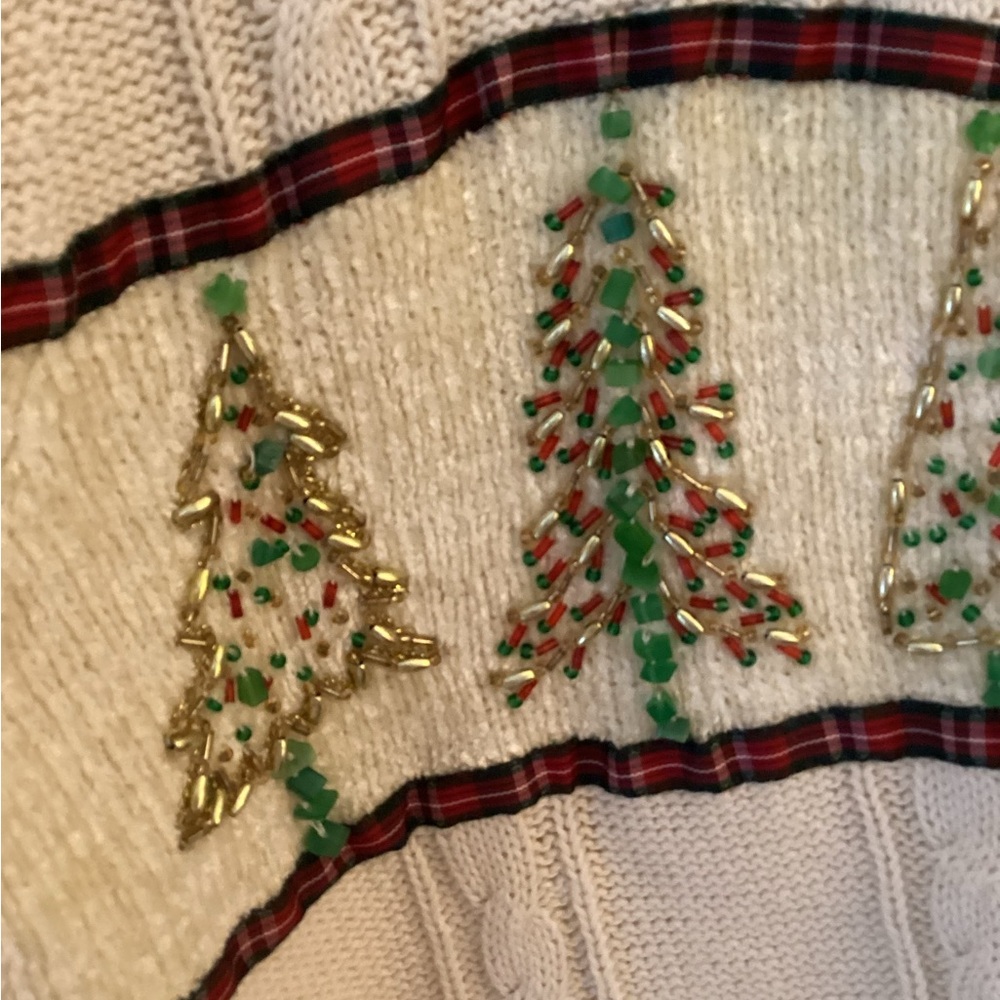 Storybook Knits Cream Cable Knit Sweater Label Detail